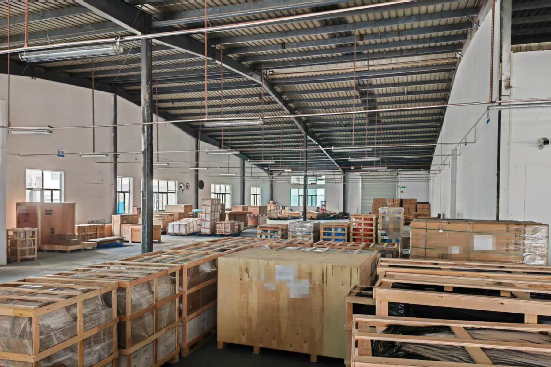 Different packed building-material and furniture orders staged for shipment review